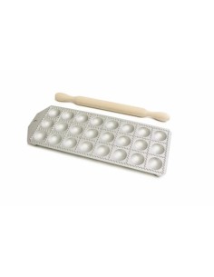 Round ravioli mould with wooden rolling pin for homemade pasta