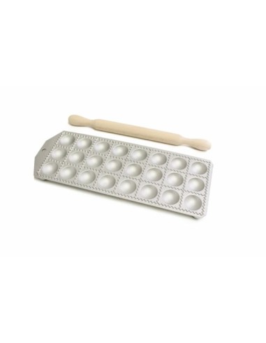 Round ravioli mould with wooden rolling pin for homemade pasta