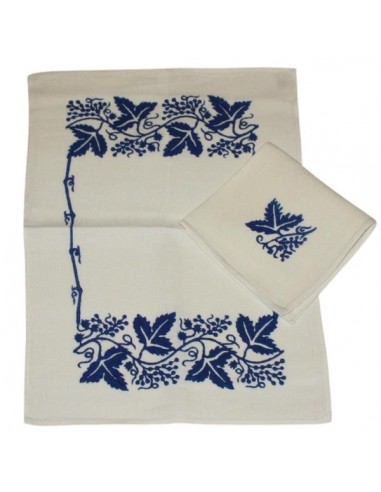Single-person placemat set with matching napkin in traditional blue block-printed linen.