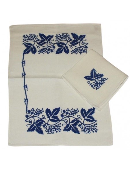 Single-person placemat set with matching napkin in traditional blue block-printed linen.
