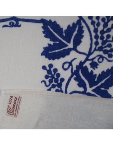 Close-up detail of traditional blue hand-block printing on Pascucci linen fabric